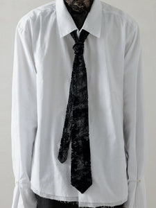 CARVED TIE