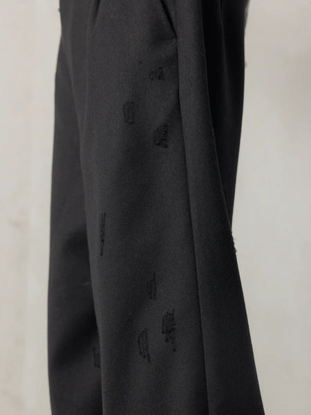 DISTRESSED WOOL PANTS